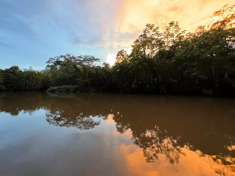 Orange sky reflected on the lagoon at sunset