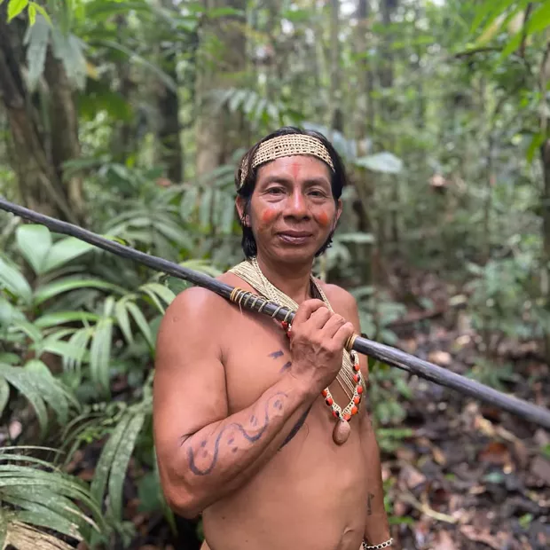 Waorani warrior with his spear in the forest